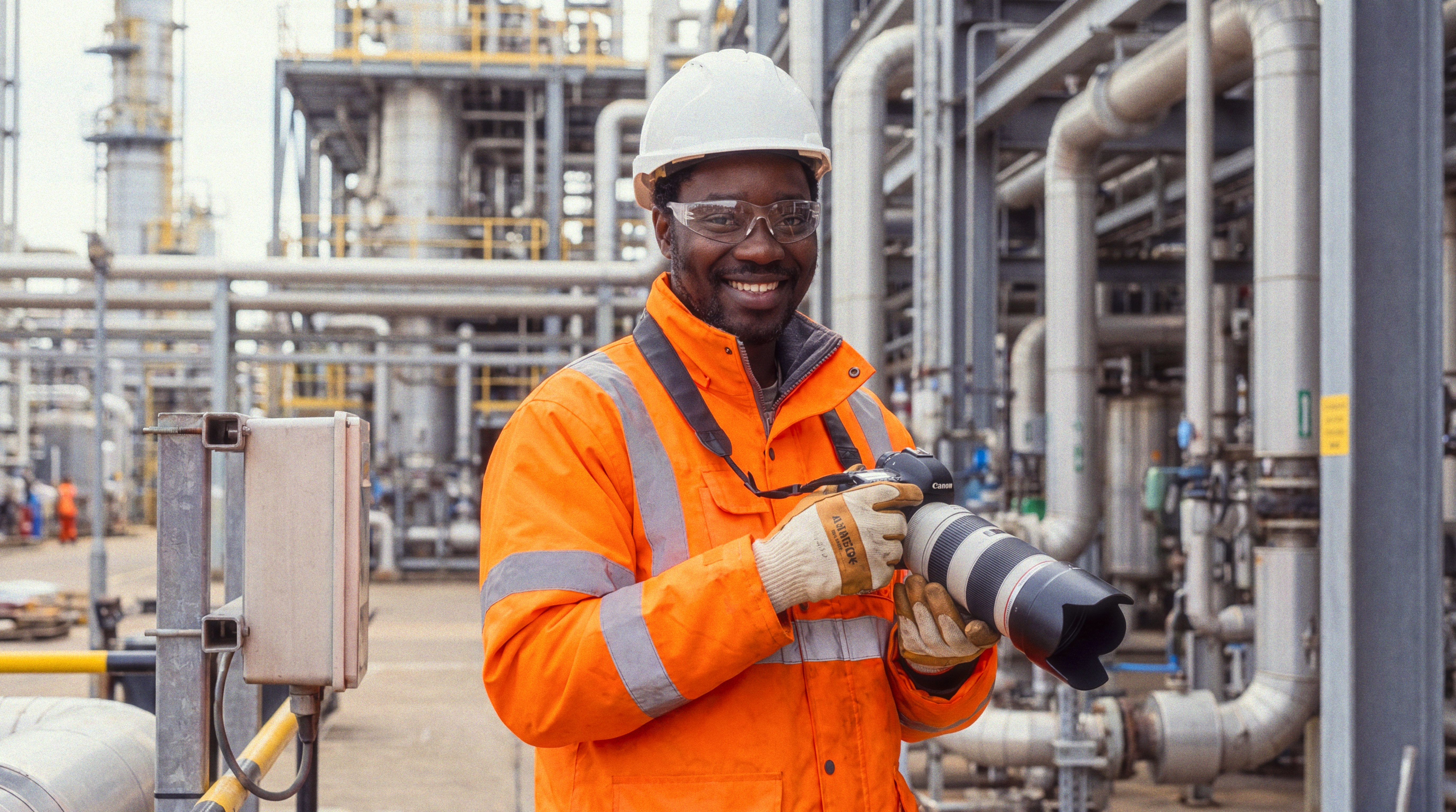 Paul wearing PPE while photographing an industrial facility