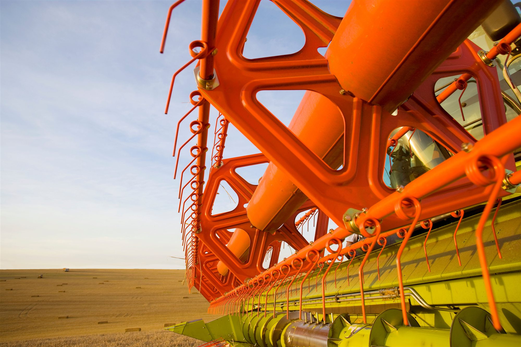 Close view of the cutting reel and header on a combine harvester
